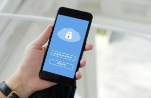Person using a phone to access secure online document storage.