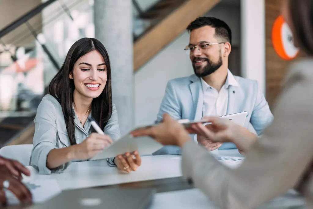 Couple signing a legal will