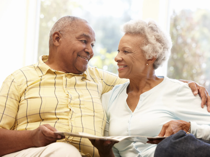 An older couple sitting together at home — for many Alabama families, a second marriage brings new estate planning questions about protecting both a spouse and children from a previous relationship.